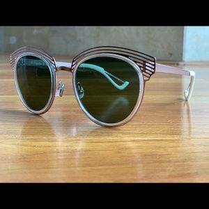 Dior Enigme rose gold frame / dark green lens